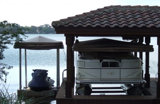 Full coverage, Pontoon Boat Cover. Hemp color in closed position