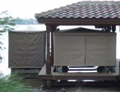 Full coverage, Pontoon Boat Cover both in closed position. Beige Color