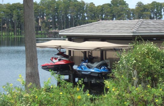 Touchless Cover in action featuring a personal watercraft cover for Jet ski on the water