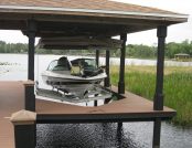 Automatic Boat Cover in a boat house on a Florida Lake